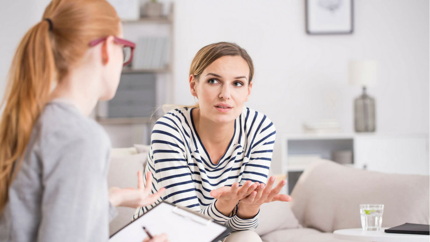 Female patient talking to counsellor