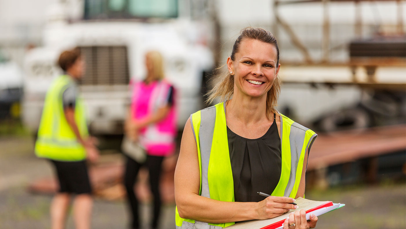 Women Working in the Transport Industry Wearing Hi-Vis Clothes.