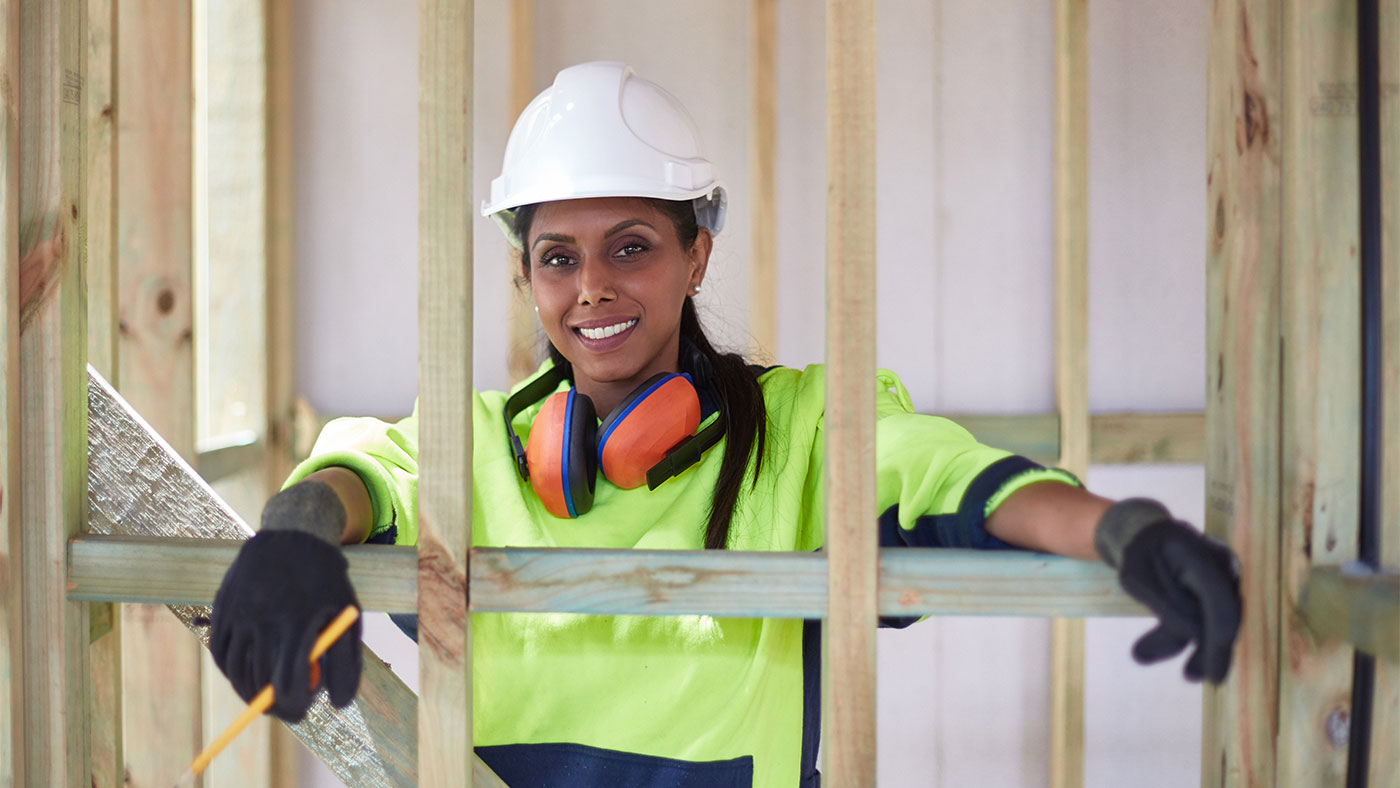 Portrait of smiling engineer at construction site